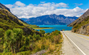 The road around Lake Hāwea in Otago.