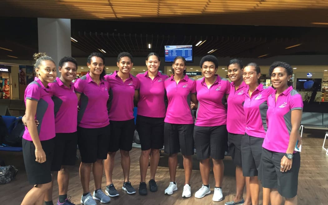 Members of the Fiji Pearls team en route to Singapore.