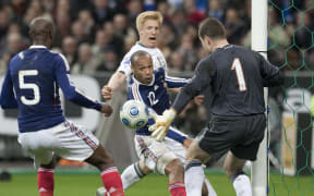 The French footballer Thierry Henry controls the ball with his hand against Ireland.