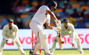 India's batsman Rishabh Pant plays a shot on day five of the fourth cricket Test match between Australia and India at The Gabba in Brisbane on January 19, 2021.