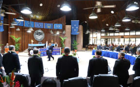 President David Panuelo walks into the Federated States of Micronesia's legislative chamber.