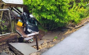 A landslip caused the collapse of a carport on Otitori Bay Road, Titirangi, after more rain overnight on Sunday 29 January.