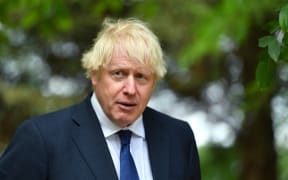 Britain's Prime Minister Boris Johnson attends a national service of remembrance at the National Memorial Arboretum on August 15, 2020.