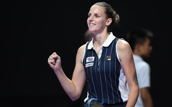 Karolina Pliskova of the Czech Republic celebrates after winning the women's singles round robin match against Simona Halep of Romania at the WTA Finals Tennis Tournament in Shenzhen, south China's Guangdong Province, Nov. 1, 2019.
