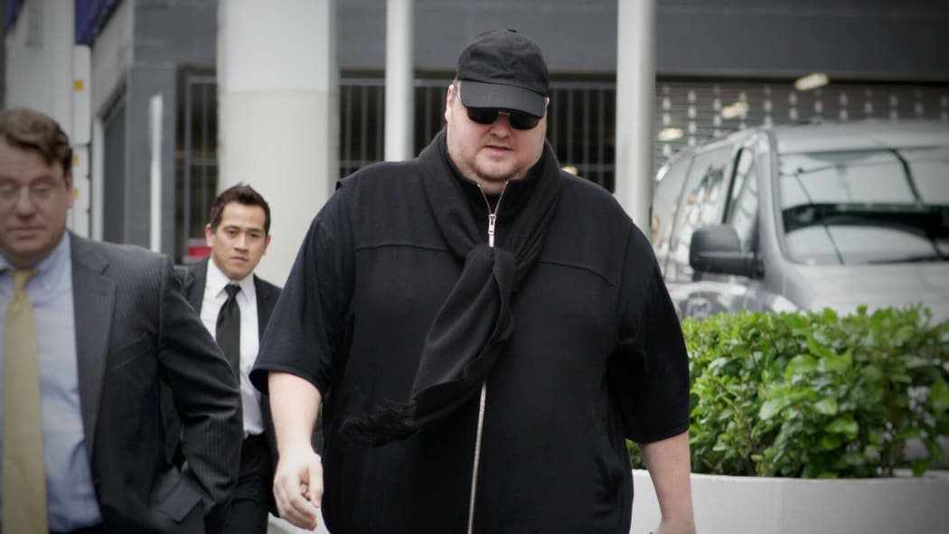Kim Dotcom arrives at court for his extradition hearing