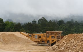 Extractive industries bring upheavals to Papua New Guinea communities: earth-moving underway for the ExxonMobil-led Liquefied Natural Gas project in Hela Province.