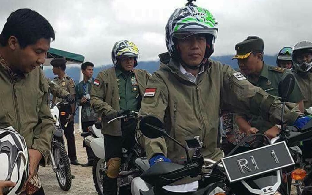 Indonesian president Joko Widodo in West Papua, May 2017, inspecting work on the new Trans-Papua Highway, one of a series of infrastructure projects his government is building in the region.