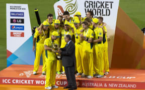 Dr N Srinivasan presents Australia with World Cup 2015.