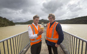Operations controller James Talbot and headworks manager Joseph Chaloner Warman take samples at Cosseys Dam.