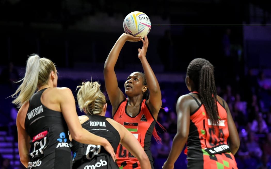 Joyce Mvula of Malawi about to shoot against the Silver Ferns in 2019.