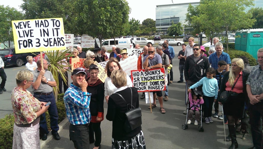 Protestors outside the Southern Response offices.