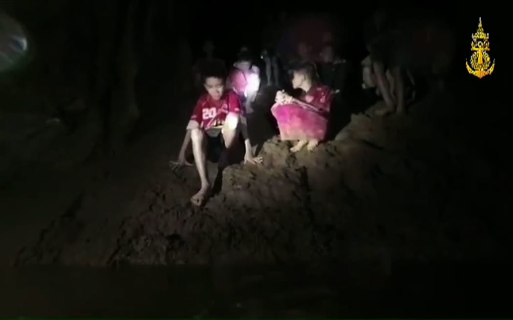 Footage released by The Royal Thai Navy shows the missing children inside the Tham Luang cave.