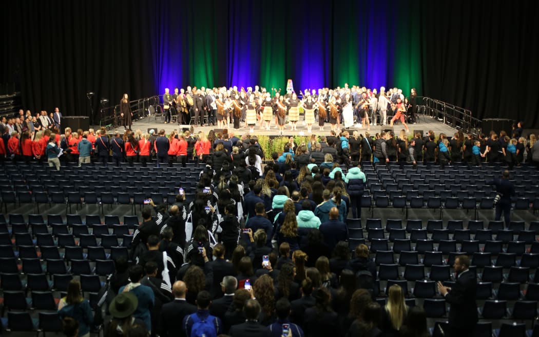 Football teams being led to their seats at the official pōwhiri for the FIFA Women's World Cup.