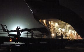 Cargo is unloaded from a C-17 Globemaster III aircraft at Balad air base in 2008.