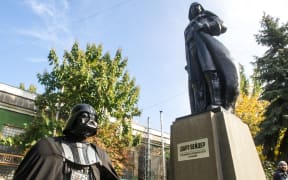 A statue of Lenin is replaced into one of Darth Vader, an oddly prominent figure in local politics.
