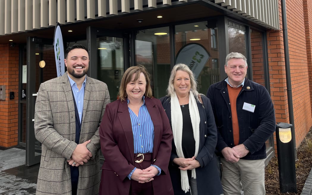 (From left) Christchurch city councillor Tyla Harrison-Hunt, Housing Minister Megan Woods, Christchurch deputy mayor Pauline Cotter and Canterbury regional councillor Greg Byrnes at Friday's opening for 20 new solar-powered Kainga Ora public housing units in Riccarton, Christchurch.