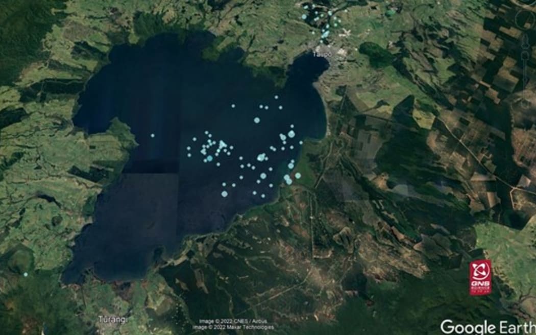 Topographical image of Taupo showing blue dots where earthquakes were located in the period 17 April - 18 May 2022