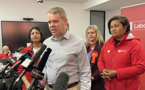 Labour leader Chris Hipkins speaks to media in Auckland on the election campaign trail, with just one week left before polling day.