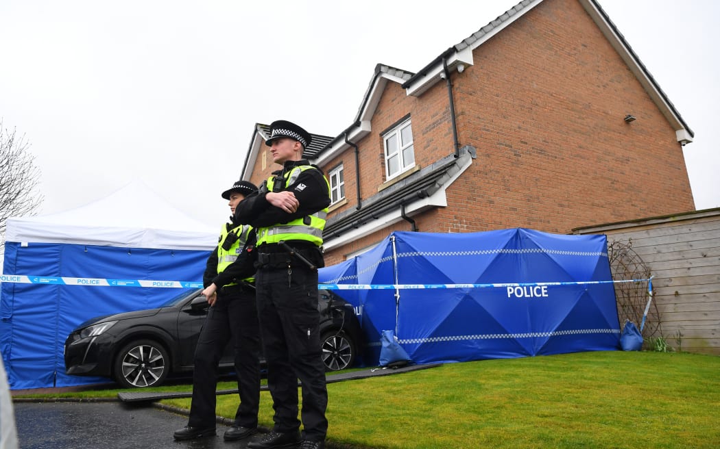 At the home of Peter Murrell, former chief executive of the Scottish National Party (SNP), and his wife, Nicola Sturgeon, former prime minister of Scotland and former leader of the SNP, in Glasgow on 5 April 2023. Police officer outside.