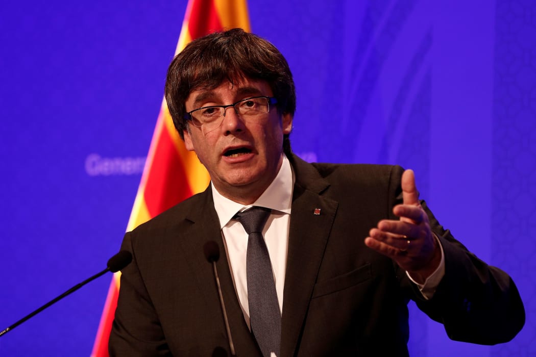President of Catalonia Carles Puigdemont holds a press conference after a meeting with the members of the Catalan government
