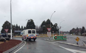 A paddy wagon heads for Ohakune, as the search for Dolphy Kohu continues.