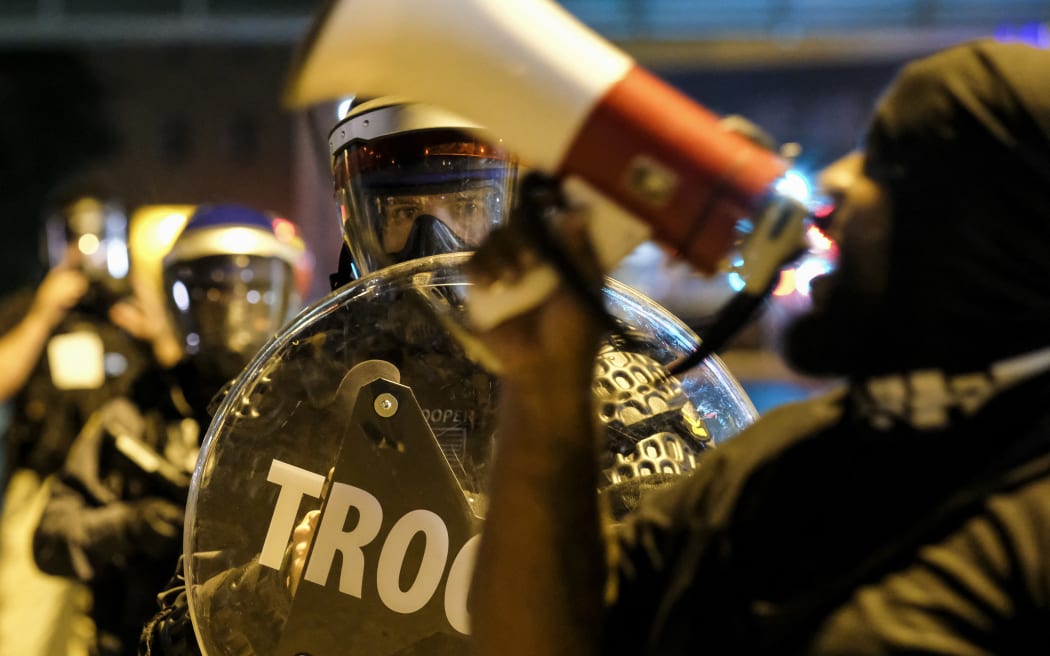 Ohio city Akron imposes curfew after protests over police killing of