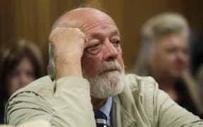 Barry Steenkamp, father of late Reeva Steenkamp, looks on after testifying at the Pretoria High Court.