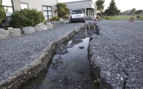 Kaikoura earthquake, the property of the Solomon family is severe, a meter wide crack runs around 400m along the west side of the house.