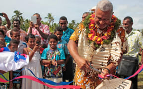Fiji's Prime Minister Frank Bainimarama commissions the Ravuka Village Water Purification Project