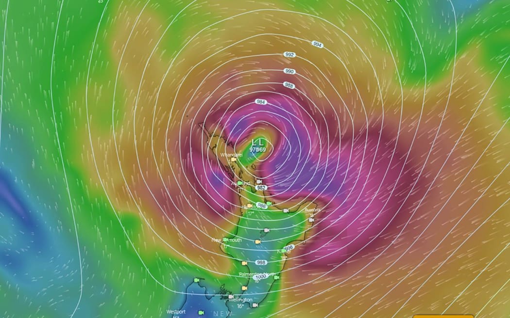A weather forecast chart from Windy.com showing a tropical cyclone over the North Island of New Zealand at midnight on January 13, 2023.
