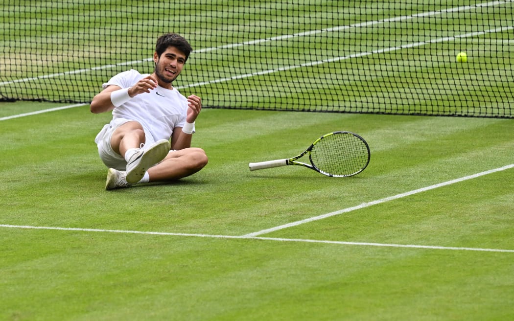 Spain's Carlos Alcaraz celebrates beating Serbia's Novak Djokovic in the men's singles final at Wimbledon.