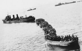 A landing party approaching the shore at Gallipoli.