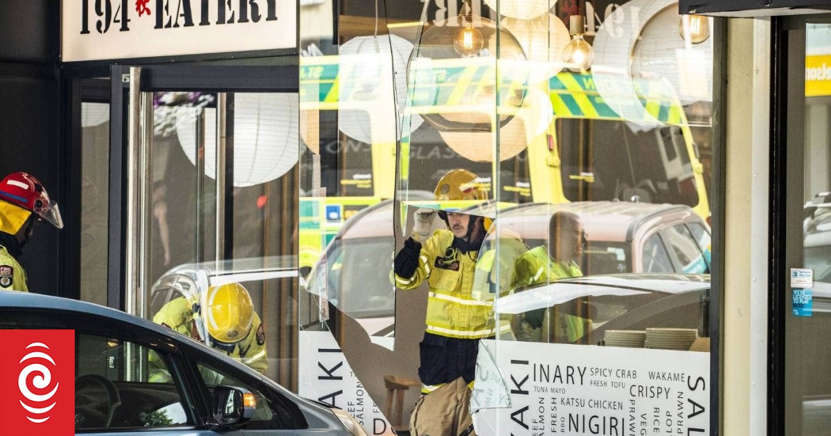 Car goes through sushi restaurant window on crowded high street
