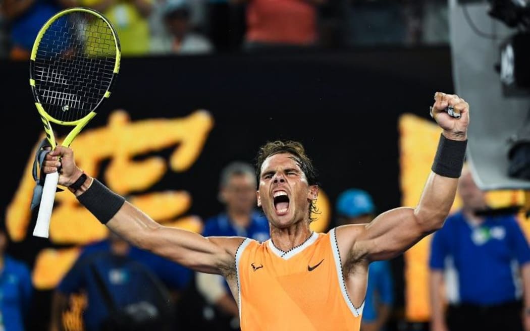 Spain's Rafael Nadal celebrates his victory against Greece's Stefanos Tsitsipas during their men's singles semi-final match on day 11 of the Australian Open tennis tournament in Melbourne on January 24, 2019