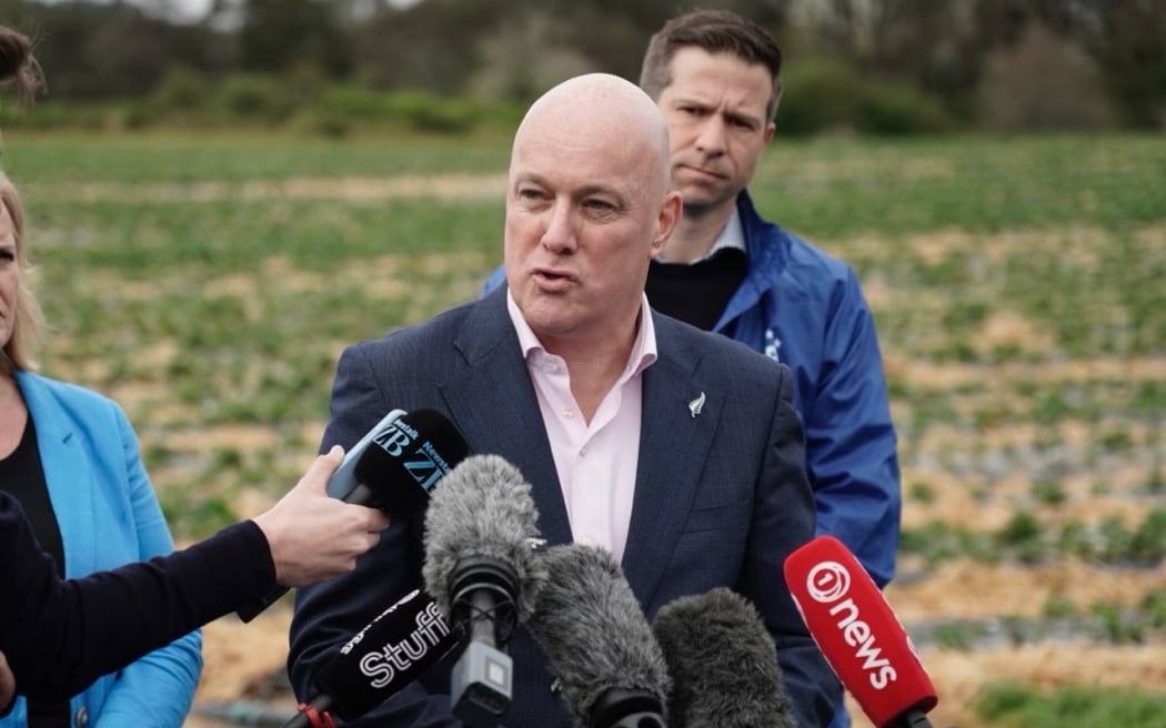Christopher Luxon and Louise Upston speak to media from Phil Greig Strawberry Farm in Auckland on 26 September 2023.