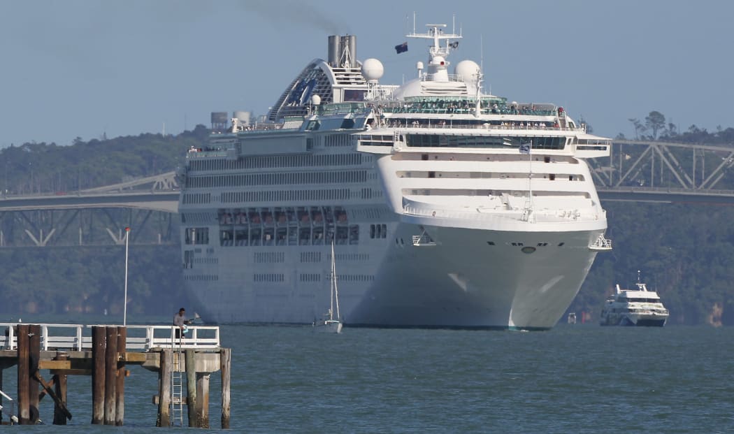 The Dawn Princess is moved into deeper water at Mission Bay on the east coast of Auckland after a tsunami alert on February 28, 2010.
