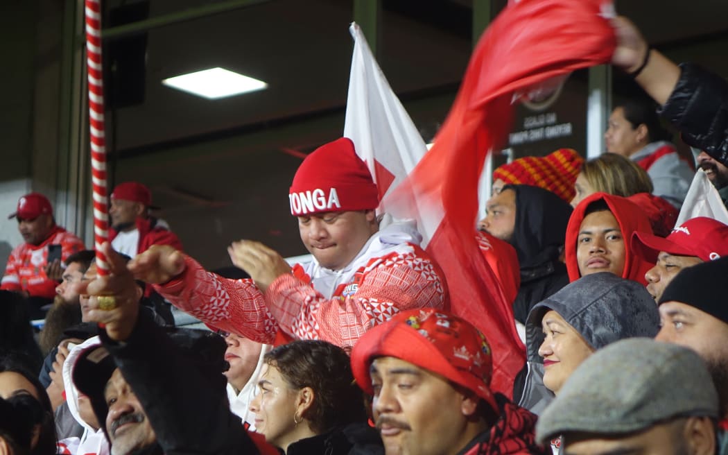 Despite some rain, Tonga fans kept up the cheer during halftime.