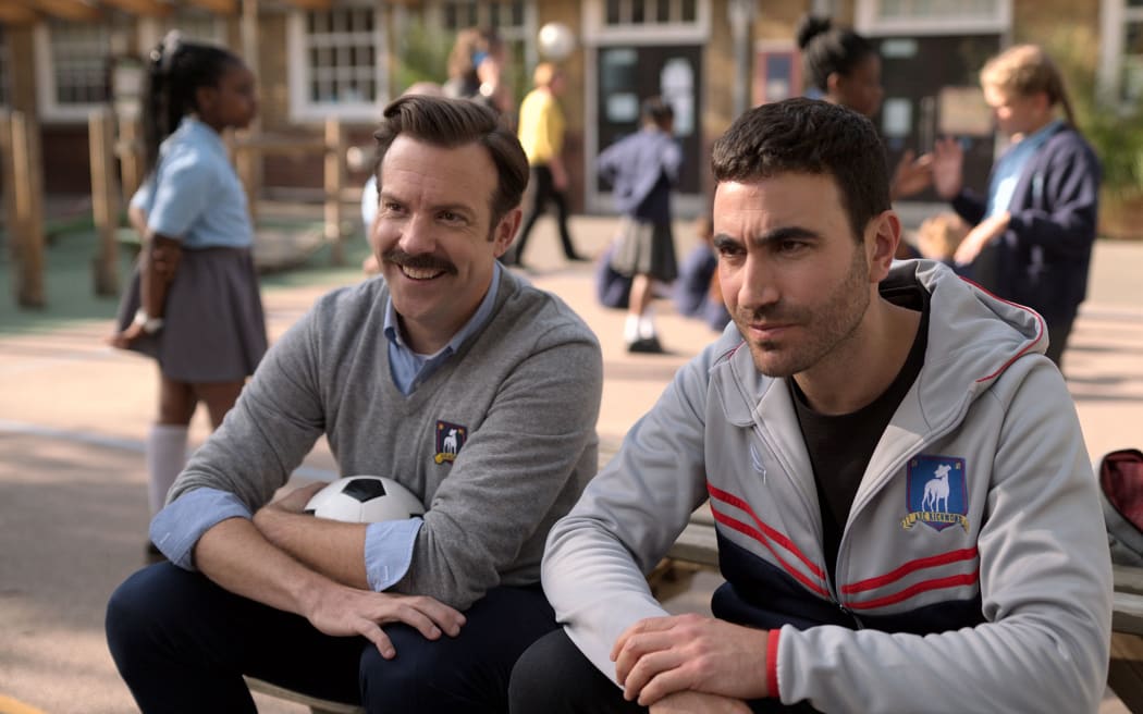 Jason Sudeikis (Ted Lasso) and Brett Goldstein (Roy) share a moment in Ted Lasso (Apple TV+)