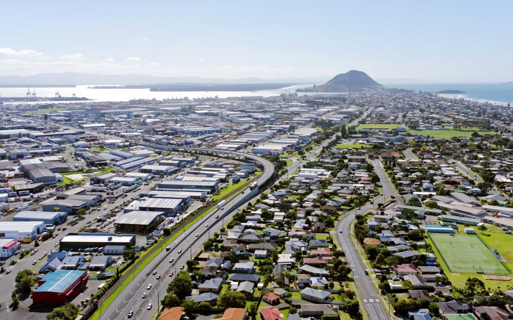 An industrial area, housing and marae sit back to back in Mt Maunganui.