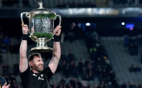 All Blacks captain Kieran Read holds the Bledisloe Cup after their win during the All Blacks vs Australia rugby match at Eden Park in Auckland on Saturday the 17th of August 2019.