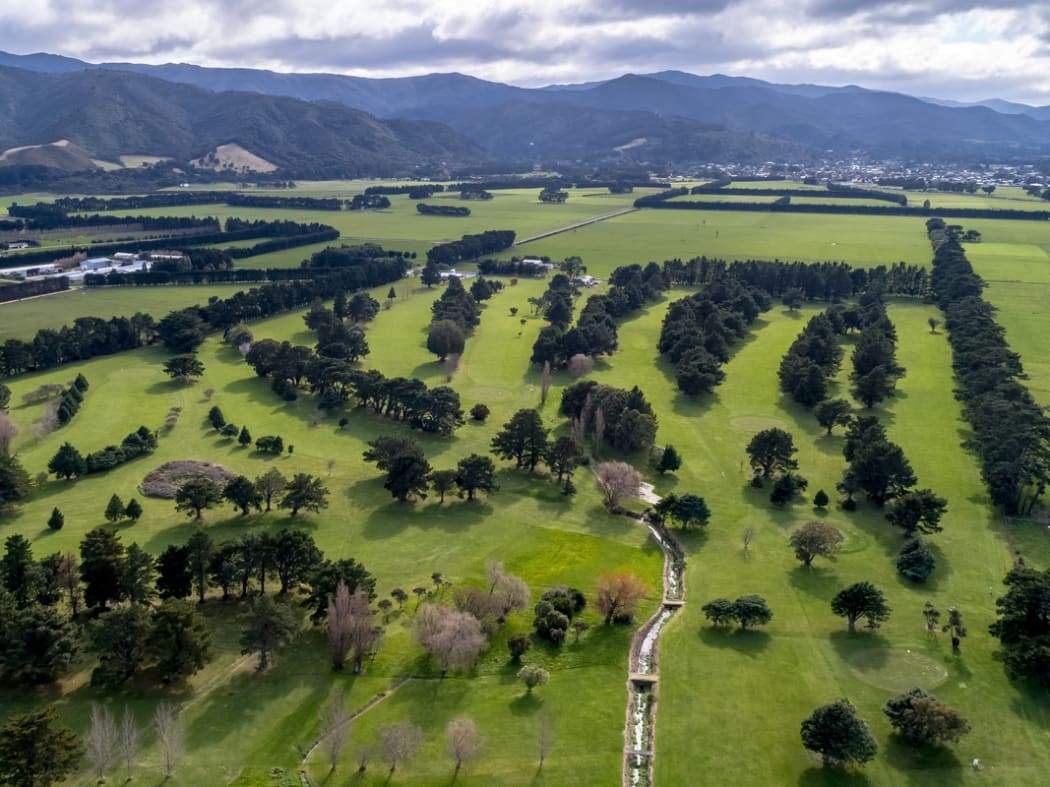 Featherston Golf Club, as shown in marketing images by Property Brokers.