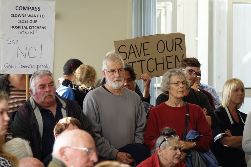 About 100 people gathered in the public gallery to oppose the hospital kitchen outsourcing.