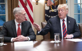United States President Donald Trump gestures towards Secretary of Defense James Mattis, 23 October, 2018 at the White House.