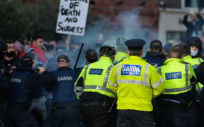 A group of Anti-Lockdown protesters clash with Gardai (Irish Police) in Grafton Street, Dublin, during Level 5 Covid-19  lockdown.