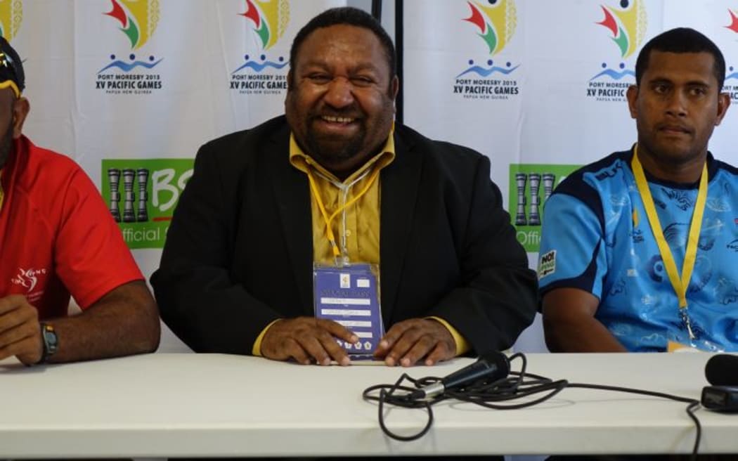 PNG Rugby League Chair Sandis Taska in the middle