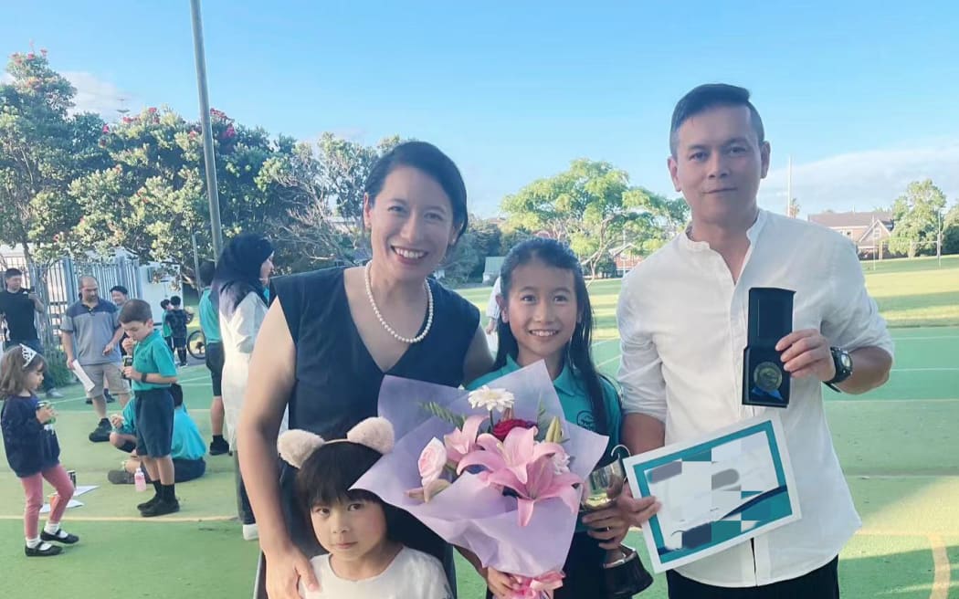 Auckland woman Serena Wei and her family. Wei says she feels excited about the right to vote in the 2023 general election, but she needs more information on how to vote.