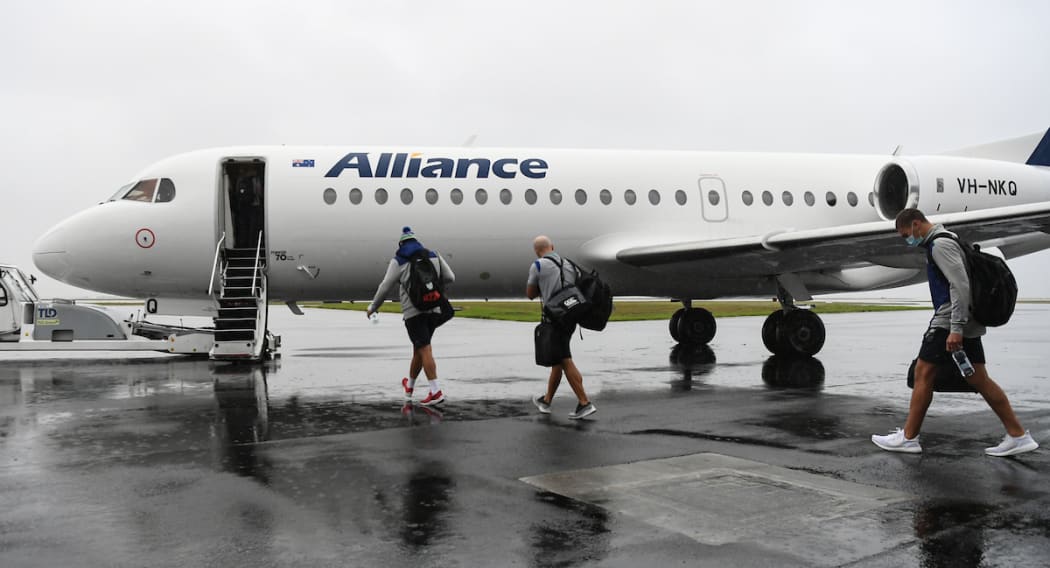 Warriors players leave on a charter flight to travel to the Australian city of Tamworth in NSW after being granted a special exemption to prepare for a re-vamped NRL season.