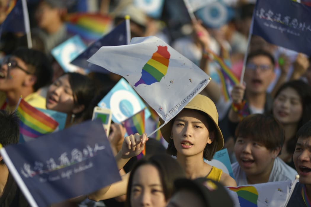 People take part in a rally in support of same-sex marriage near the Presidential Office in Taipei on 18 November, 2018.