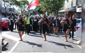 Supporters of Māori wards march through Whakatane.