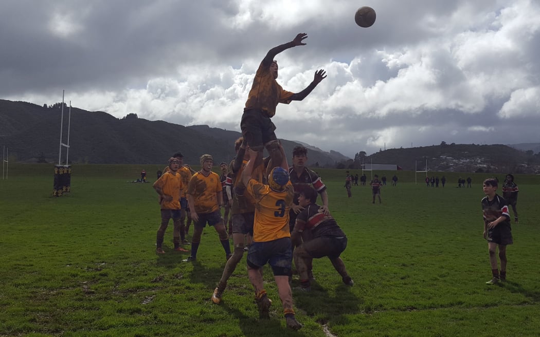 Francis Douglas Memorial College (Taranaki) do battle with Scots College (Wellington) at the Hurricanes U15 schools tournament in Wellington (Upper Hutt).